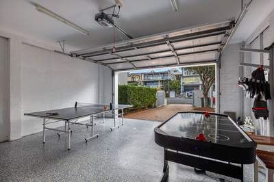 Garage games room with air hockey and ping pong