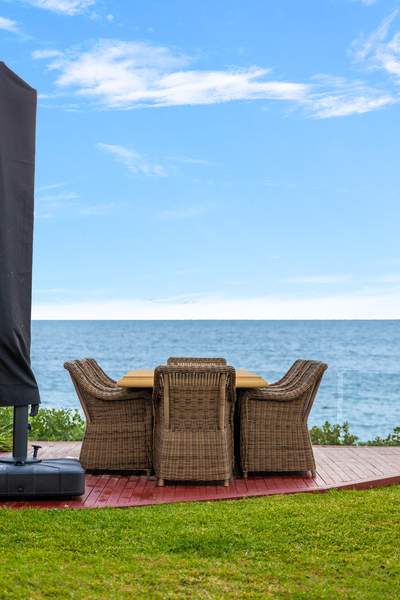 The deck at the water's edge with alfresco dining